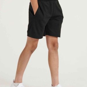 Child sporting LV887 Finden and Hales Kids Knitted Shorts, perfect for active wear or casual school attire.