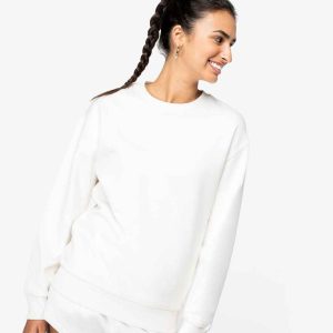 Woman smiling in the NS435 Native Spirit Unisex Crew Neck Sweatshirt, representing sustainable workwear fashion.