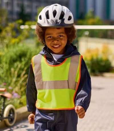 Child wearing Regatta RG714 High Visibility Hi-Vis Tabard in bright yellow with reflective stripes for safety