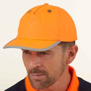 Man wearing the YK550 Yoko Hi-Vis Safety Bump Cap in vibrant orange, ideal for high-visibility workwear requirements.