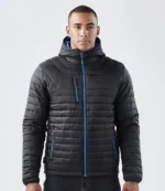 Stormtech Gravity Thermal Jacket in Black/Marine Blue, worn
