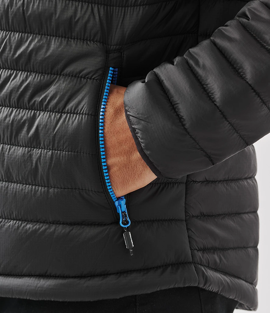 Stormtech Gravity Thermal Jacket in Black/Marine Blue, worn