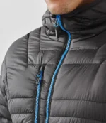 Stormtech Gravity Thermal Jacket in Black/Marine Blue, worn