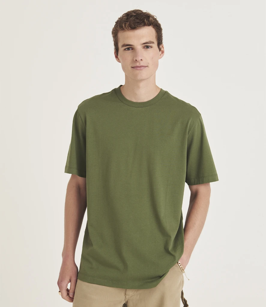 AWDis Unisex 180 T-Shirt in Earthy Green, worn