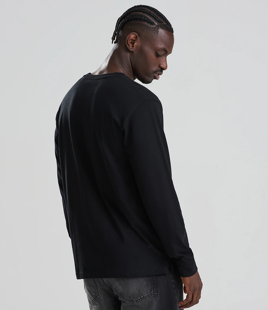 AWDis Long Sleeve 180 T-Shirt in Deep Black, worn