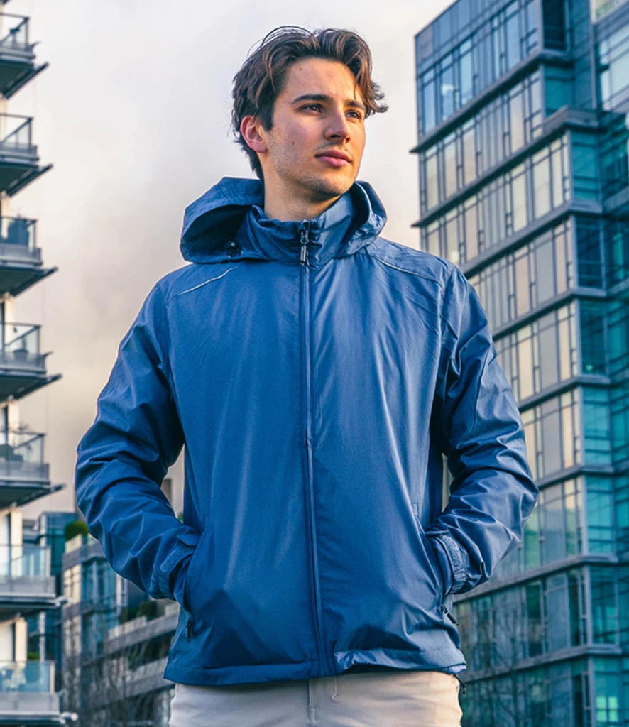 kx1-azr-model Stormtech Nautilus Performance Shell Jacket in Azure, worn