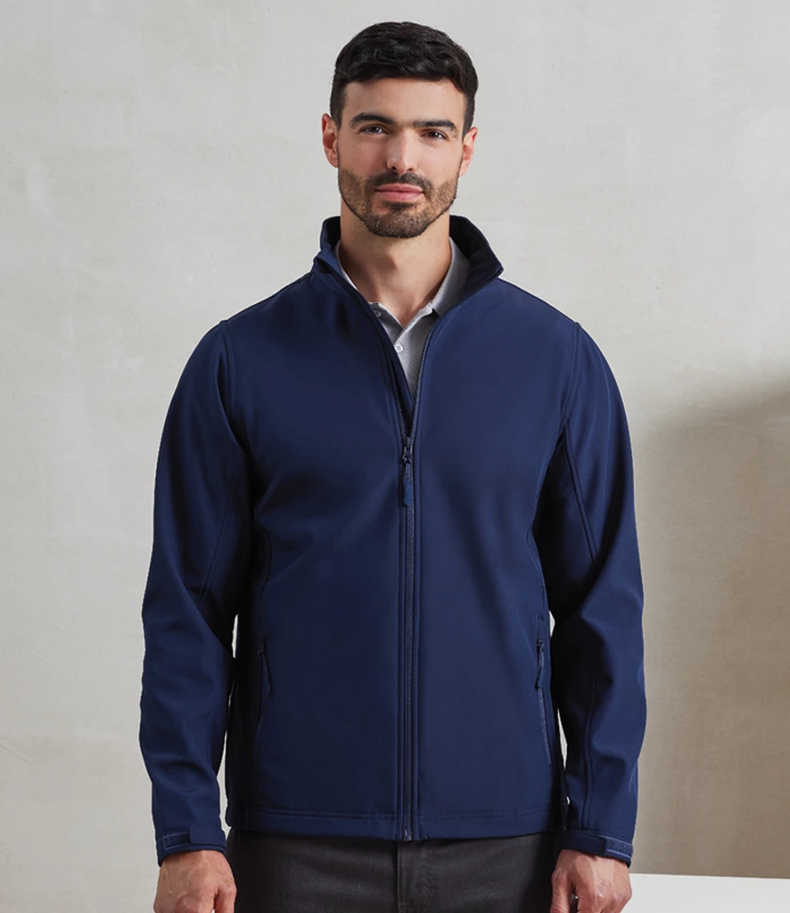 PR810-NAV-MODEL-1-HERO Premier Windchecker Recycled Printable Soft Shell Jacket, worn