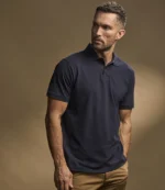 Tee Jays Heavy Cotton Pique Polo Shirt in Navy, worn
