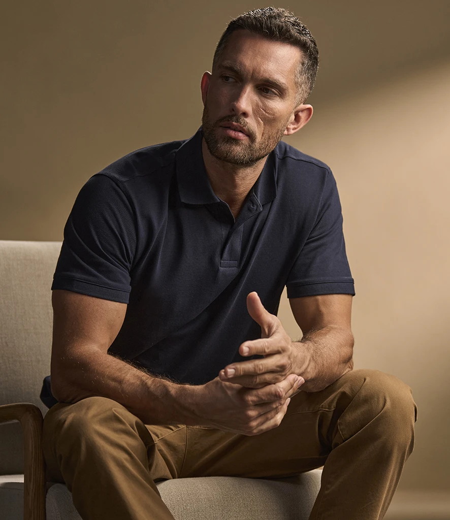 Tee Jays Heavy Cotton Pique Polo Shirt in Navy, worn