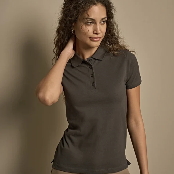 Tee Jays Ladies Heavy Cotton Pique Polo Shirt in Dark Grey, worn