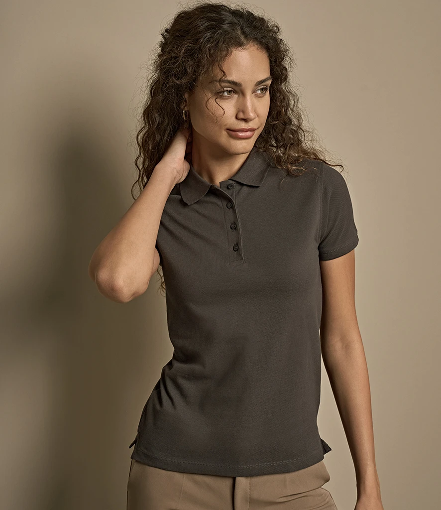 Tee Jays Ladies Heavy Cotton Pique Polo Shirt in Dark Grey, worn