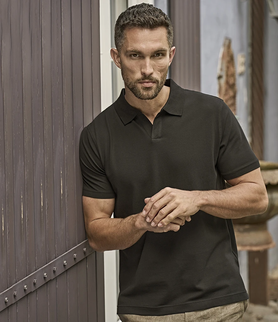 Tee Jays Luxury Stretch V Neck Polo Shirt in Black, worn