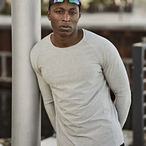 Tee Jays Long Sleeve CoolDry T-Shirt in Grey Melange, worn