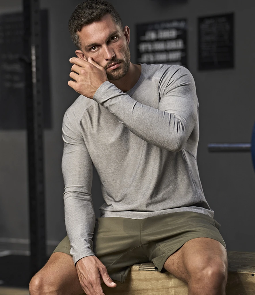 Tee Jays Long Sleeve CoolDry T-Shirt in Grey Melange, worn