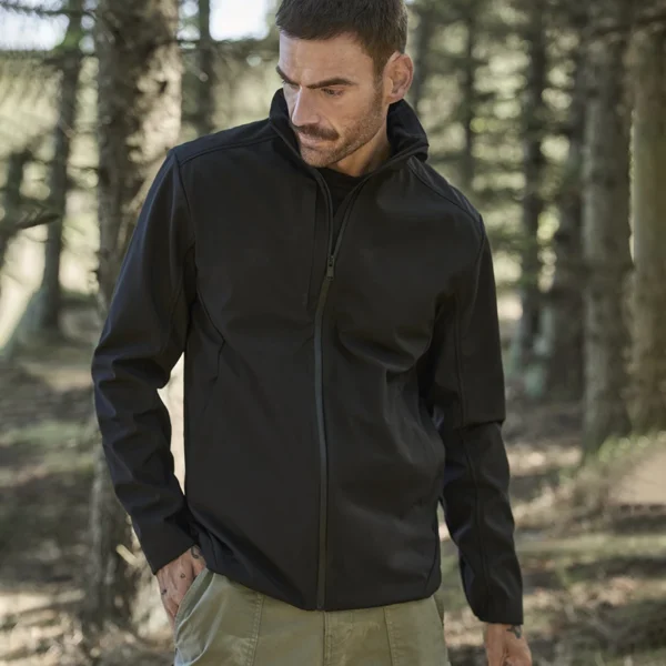 Tee Jays Performance Soft Shell Jacket in Deep Navy, worn